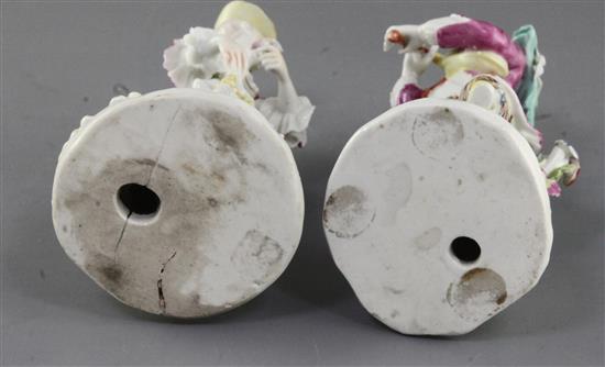 A pair of early Derby figures of a bagpiper and female companion, c.1756-7, h. 15.5cm and 16.5cm, bagpipers neck repaired